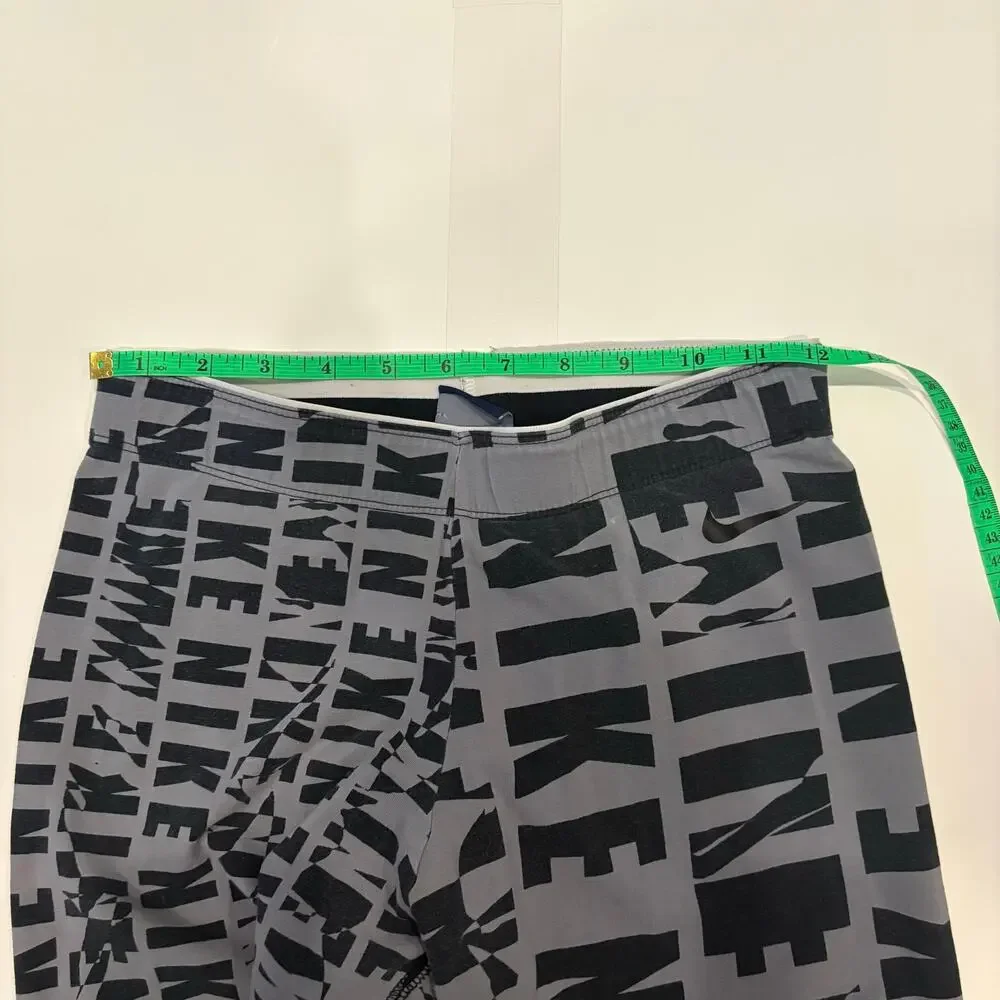 Nike “Nike” Print Leggings